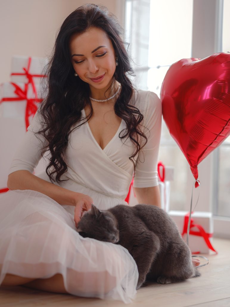 Celebrating Valentine's Day With Your Pet - Beautiful happy young woman, celebrating Valentine's Day