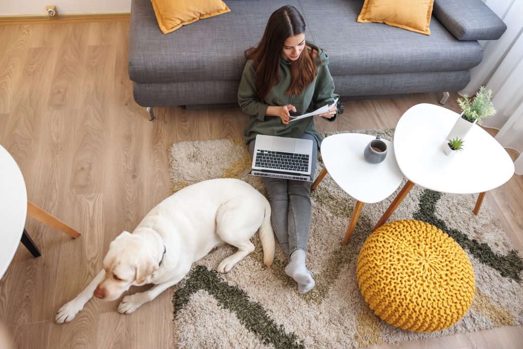 Pet-Proofing Your Home - woman with her dog in a living room